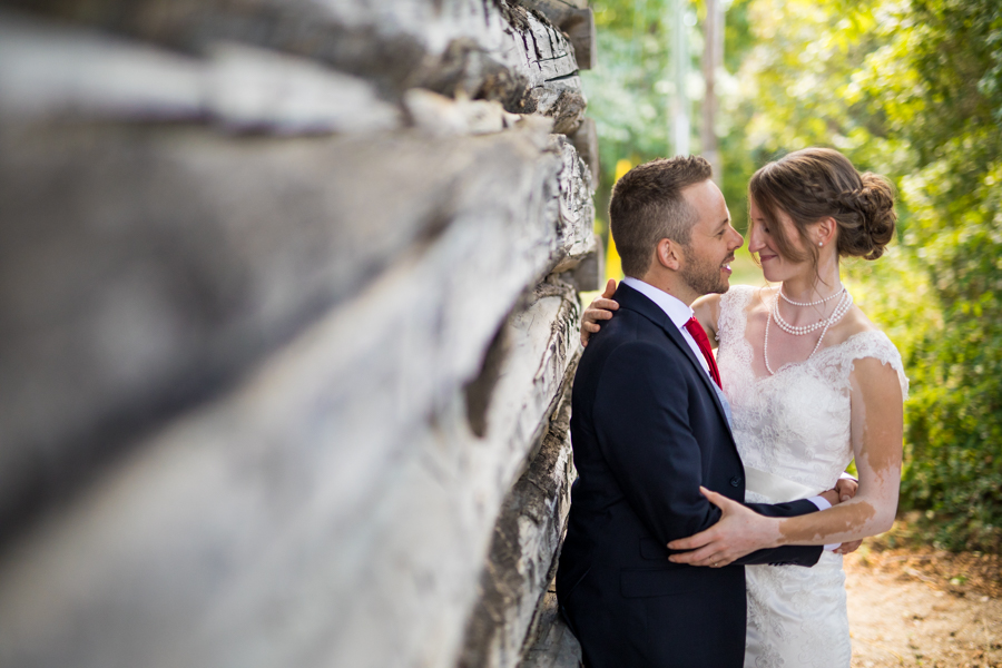 Bride and groom kiss at the nut farm, wedding in kelowna, kelowna bc, kelowna wedding photographer, amazing kelowna wedding, award winning kelowna photographers
