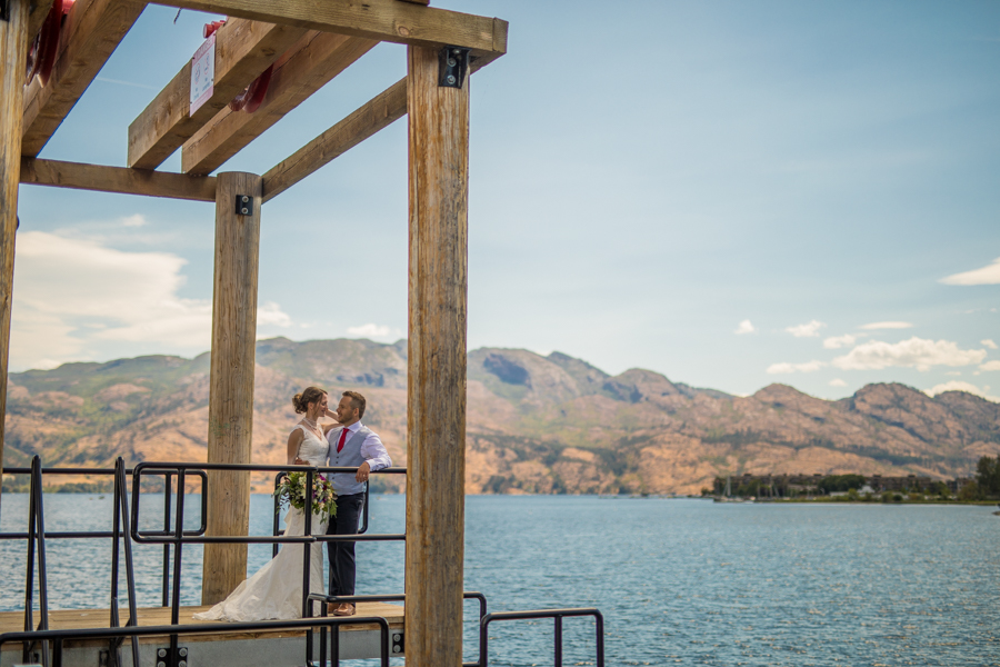 Bride and groom kiss at the nut farm, wedding in kelowna, kelowna bc, kelowna wedding photographer, amazing kelowna wedding, award winning kelowna photographers