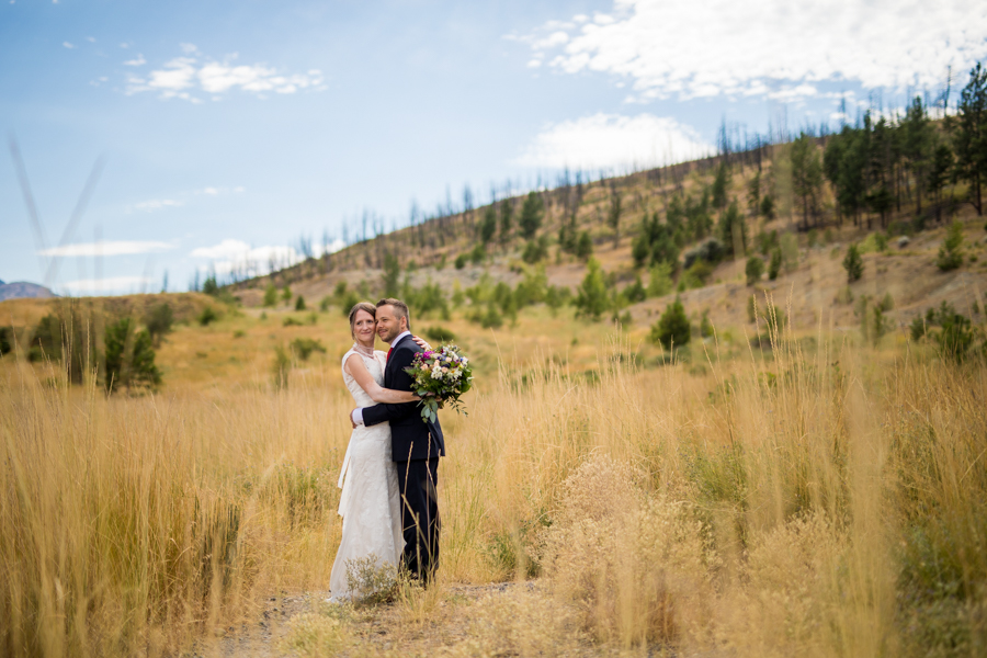 Bride and groom kiss at the nut farm, wedding in kelowna, kelowna bc, kelowna wedding photographer, amazing kelowna wedding, award winning kelowna photographers