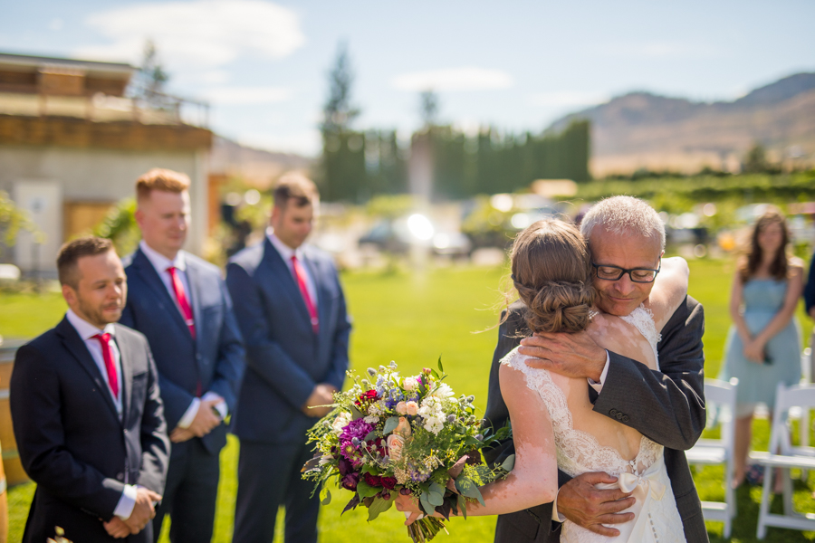 Bride and groom kiss at the nut farm, wedding in kelowna, kelowna bc, kelowna wedding photographer, amazing kelowna wedding, award winning kelowna photographers, off the grid organic winery
