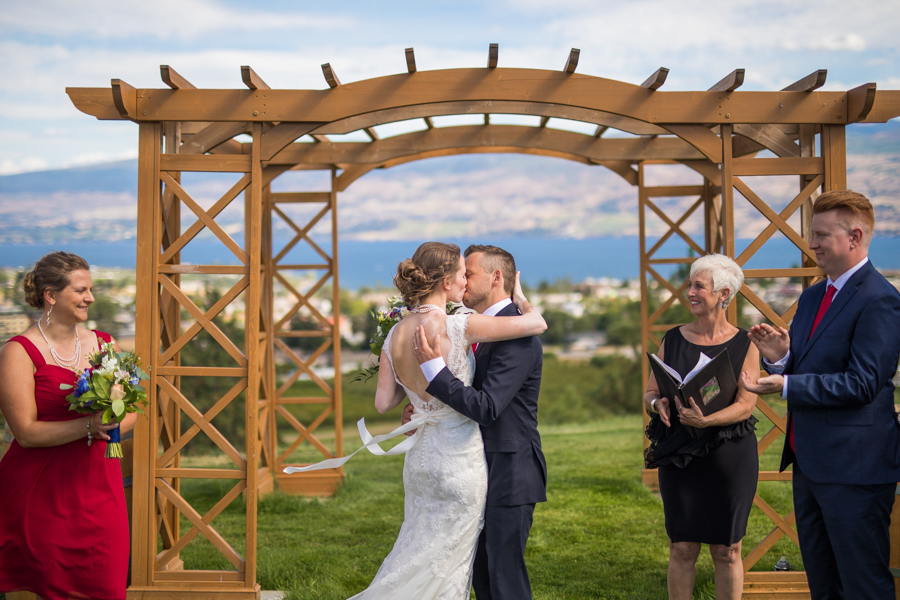 Bride and groom kiss at the nut farm, wedding in kelowna, kelowna bc, kelowna wedding photographer, amazing kelowna wedding, award winning kelowna photographers, off the grid organic winery