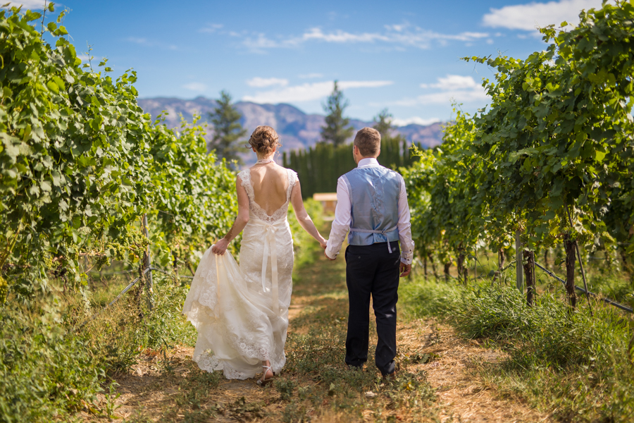Bride and groom kiss at the nut farm, wedding in kelowna, kelowna bc, kelowna wedding photographer, amazing kelowna wedding, award winning kelowna photographers, off the grid organic winery