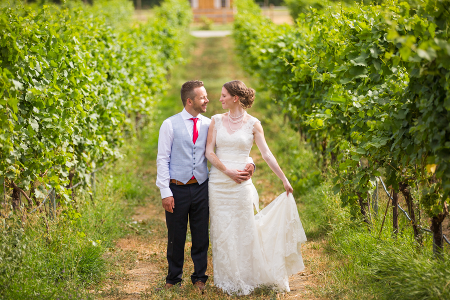 Bride and groom kiss at the nut farm, wedding in kelowna, kelowna bc, kelowna wedding photographer, amazing kelowna wedding, award winning kelowna photographers, off the grid organic winery