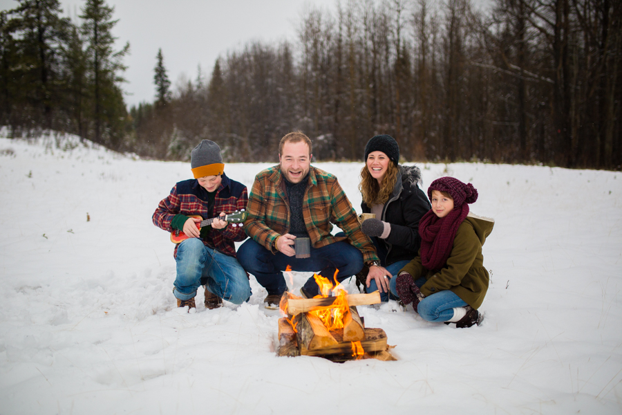 family photo around the campfire 