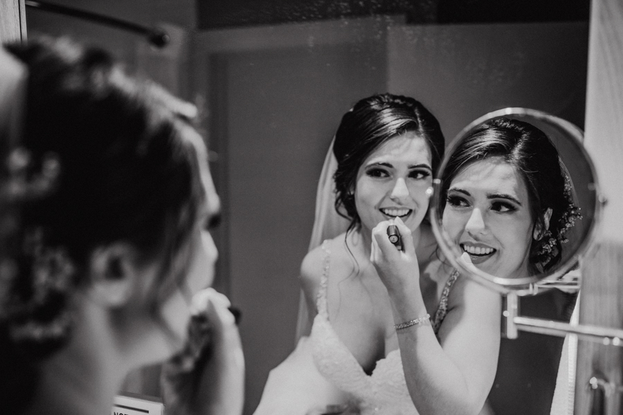 bride in her reflection in her room