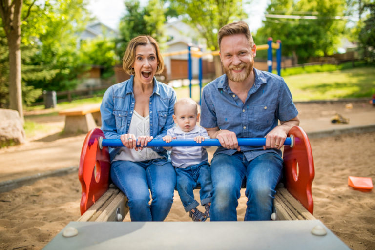 Calgary park family photos on a swing