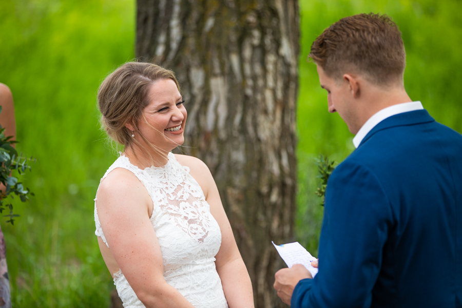 bride and groom crying at fish creek park