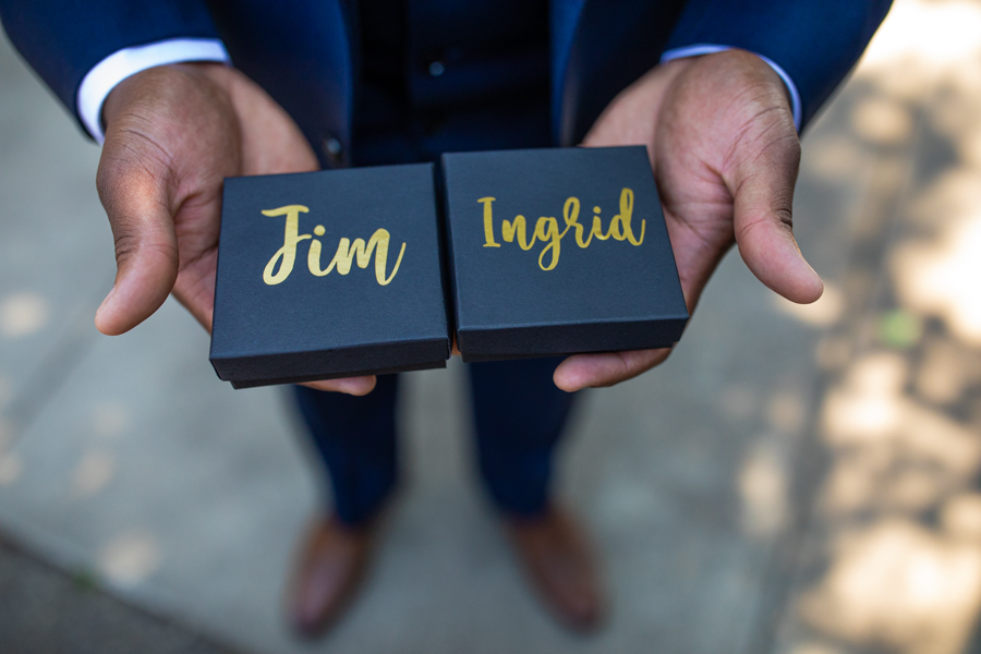 groom having gifts for his parents