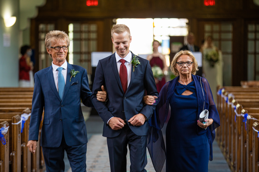 groom walking down the aisle of St. Mary's Cathedral for a wedding