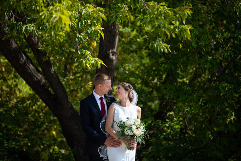 Bride and groom outside of St. Mary's Cathedral after a wedding