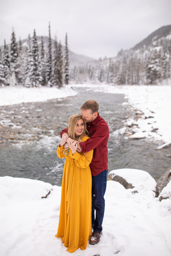 winter engagement photos at Elbow falls